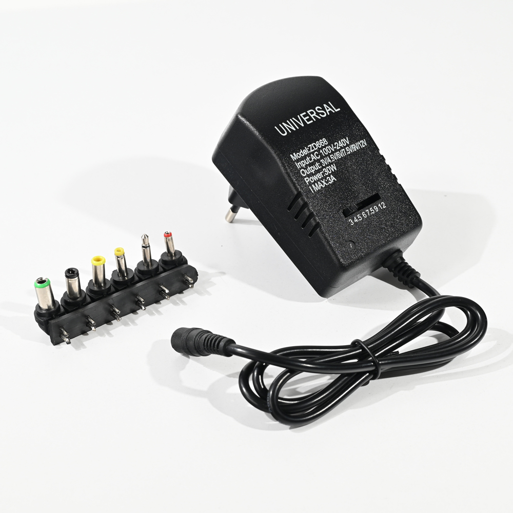 Univerzalni punjač AC/DC adapter sa podesivim naponom 3-12V 3A 30W